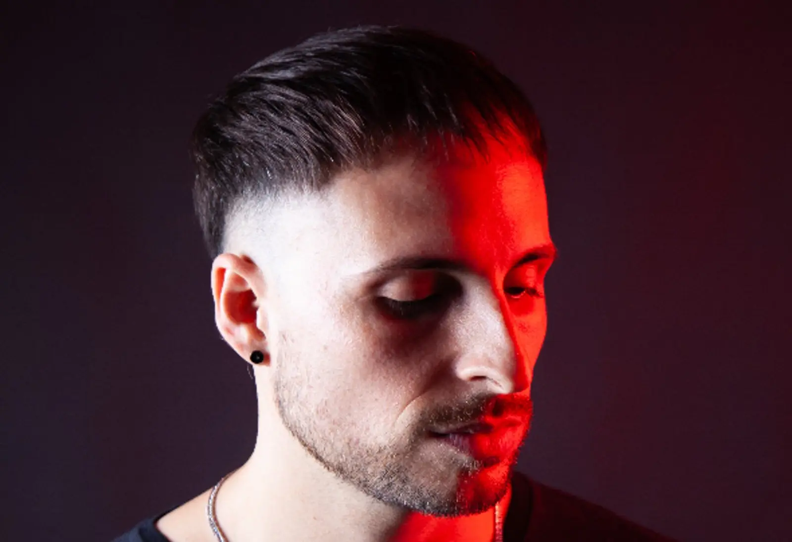 Yanacone, lit by a single red light